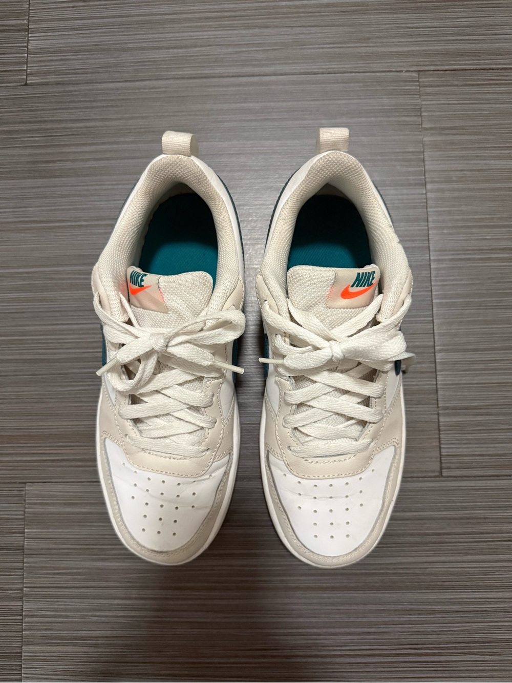 Nike Kids White Cream Sneakers with Teal and Orange Accents